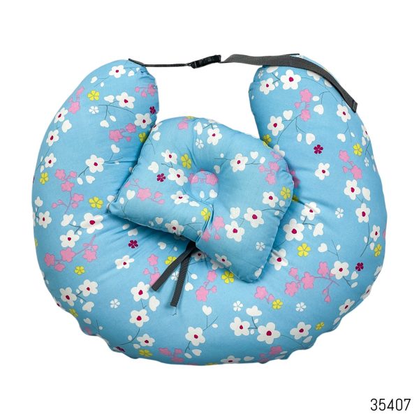 baby feeding comfortably using nursing pillow with head support