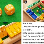 Family playing Shut The Box wooden dice game educational toy